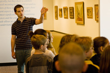 A student teaching young children about art