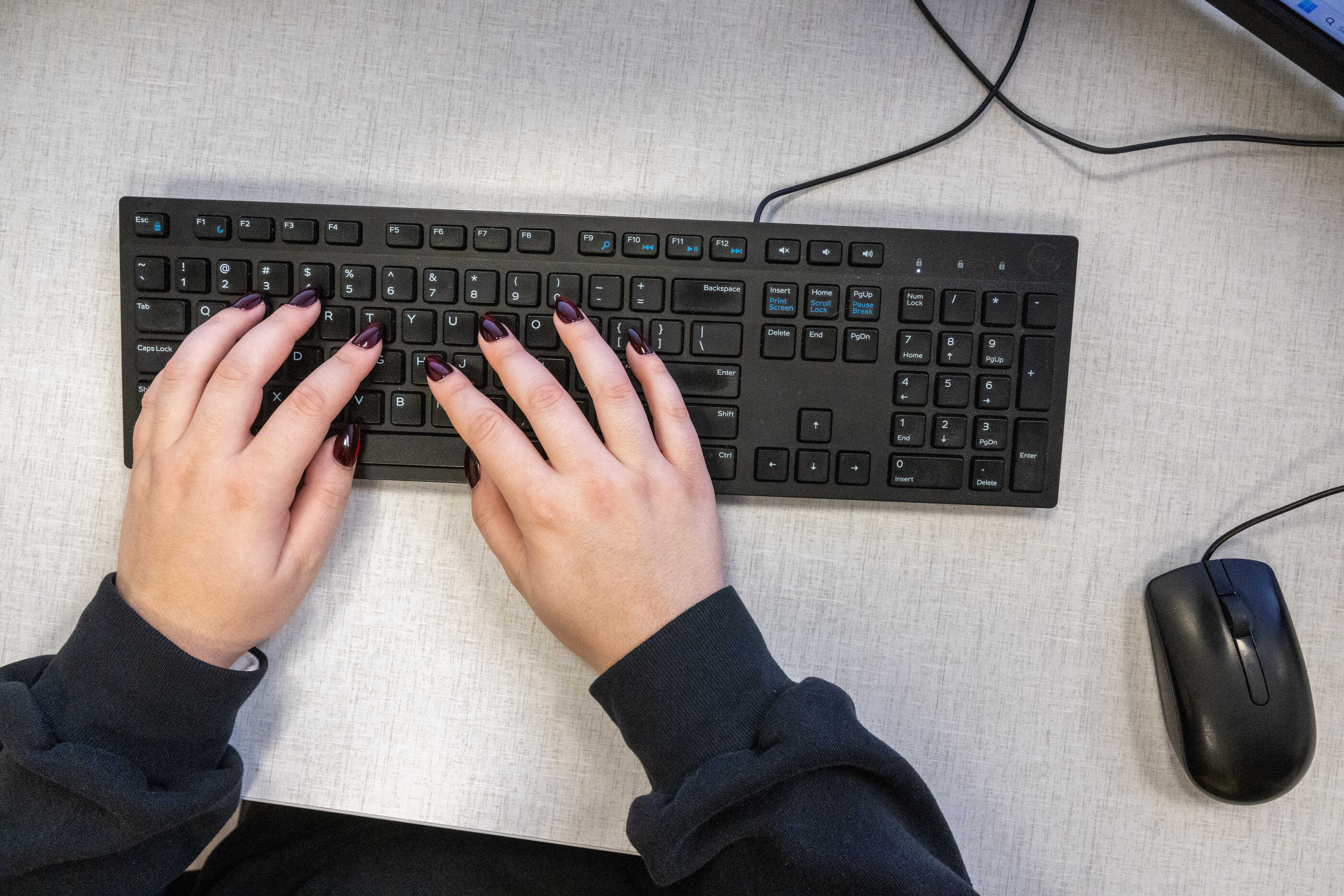 hands on a keyboard
