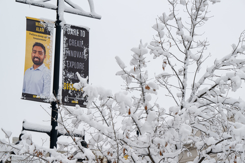 Lightpole banner featuring Wahid Alam