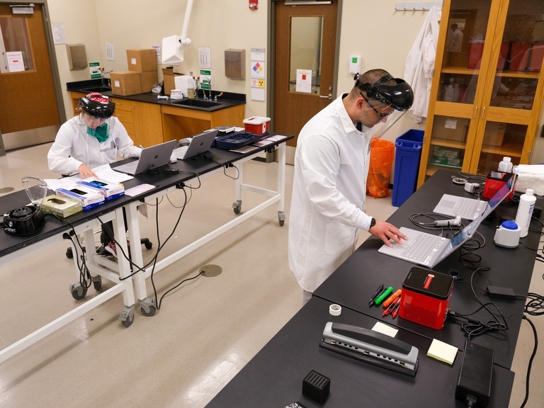 Staff members work in State Hygienic Lab during COVID State Hygienic Lab COVID work