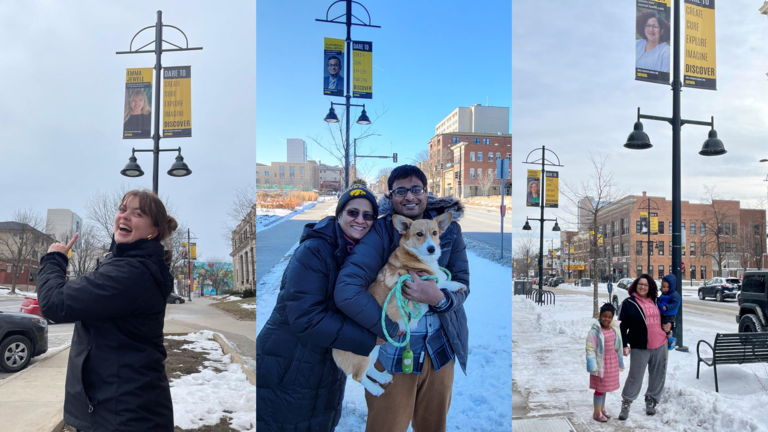 three students stand with their banners in downtown Iowa City