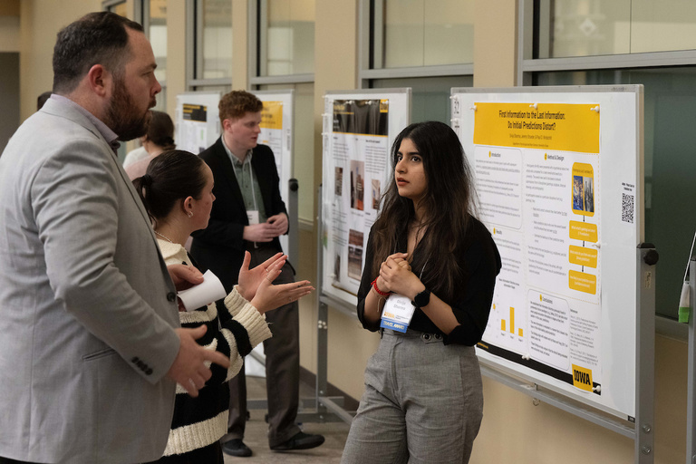 A student discusses her research during SURF