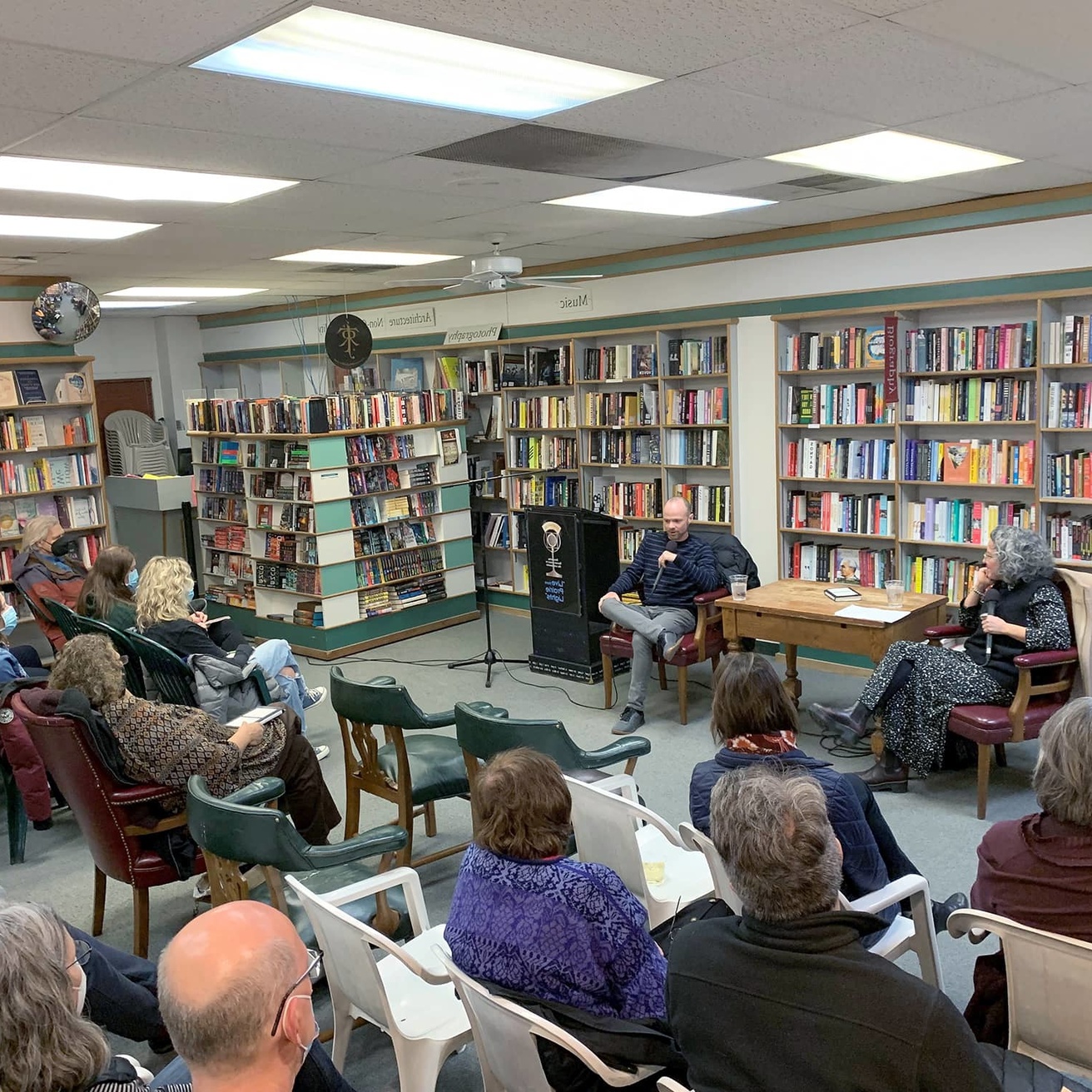 people gathered at a book reading event
