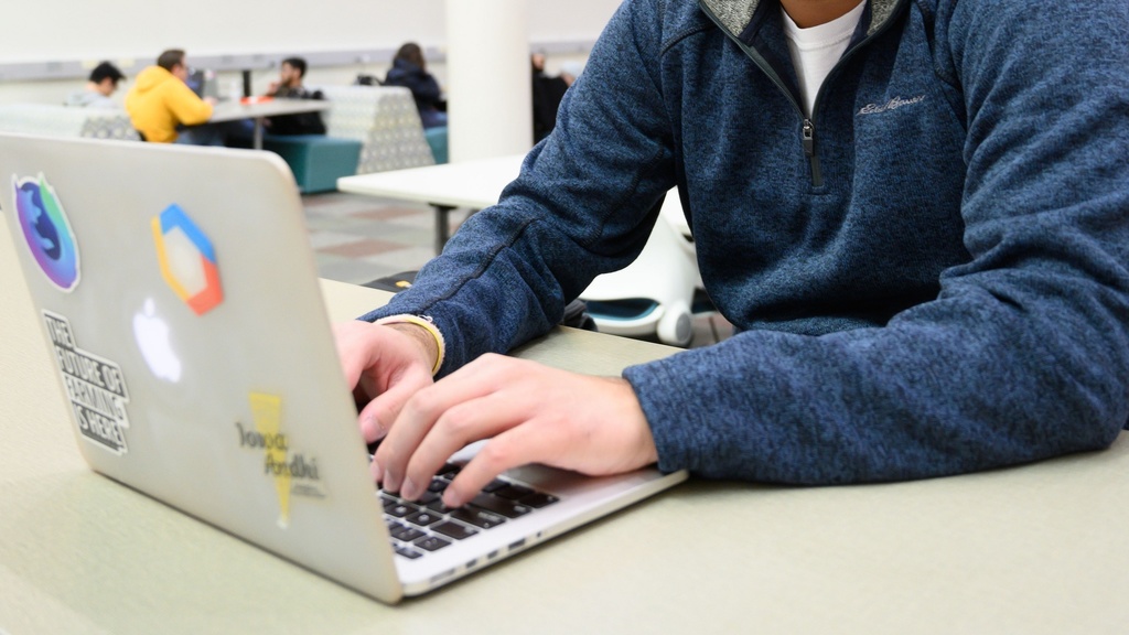 UI student working on a computer